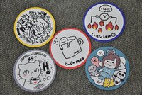 来場者全員に配布された特典のコースター。