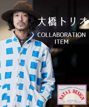 「CADENCED SHOPCOAT」を着用した大橋トリオ。