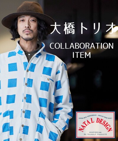 「CADENCED SHOPCOAT」を着用した大橋トリオ。