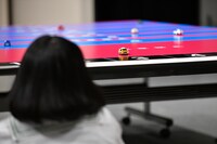 クラッシュしたチョロQ。