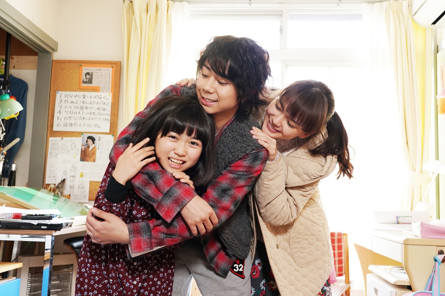 映画「トラさん」高畑家の家族写真。