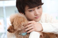 ユーキとトイプードル。