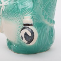 夢たぬきの腰にぶら下げられた酒徳利。