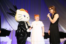 過去に行われたYOSHIKIディナーショーの様子。