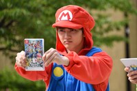 「大乱闘スマッシュブラザーズSPECIAL」を掲げるユーキ。