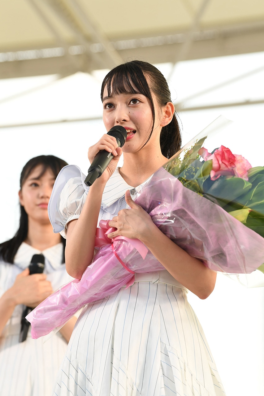 神戸港初寄港セレモニーで挨拶する石田みなみ。(c)STU