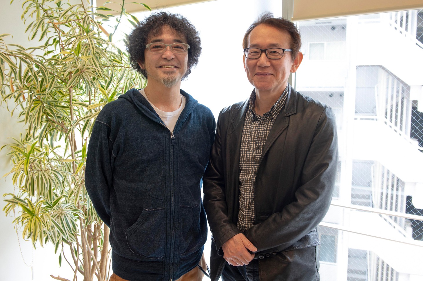 左から奥田民生、周防正行。