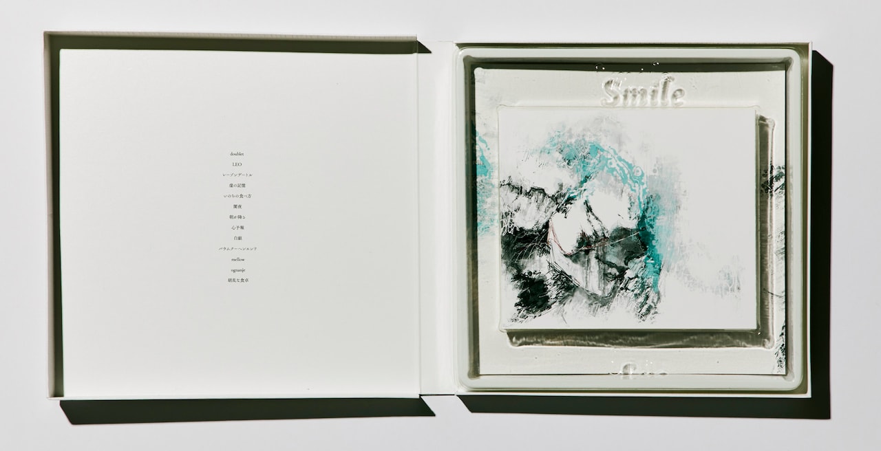 Eve アルバム“Smile” ポスター