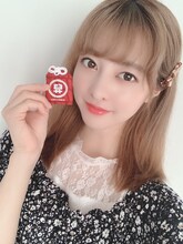 お守りを持つ羽島みき。