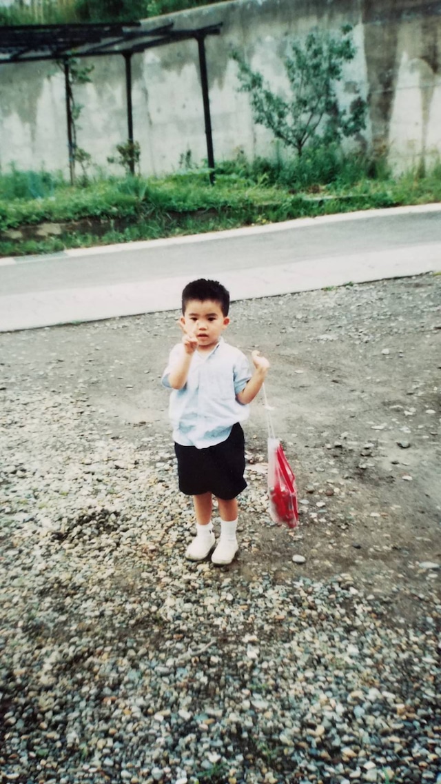 幼少期のアフロ。