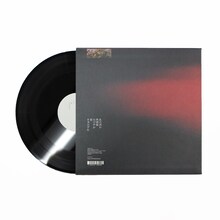 折坂悠太「あけぼの」アナログ盤ジャケットと盤面（裏）。