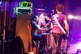 日高央(G / THE STARBEMS)、RONZI(Dr / BRAHMAN、OAU)、津田紀昭(B / KEMURI、THE REDEMPTION)。(Photo by sotobayashi kenta)