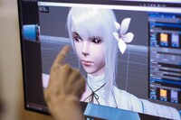 カイネの瞳のハイライトを調整している様子。