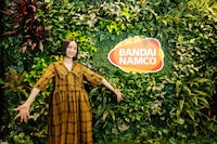 旧コーポレートロゴマークとのっちさん。