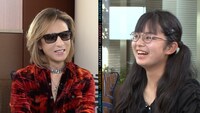 YOSHIKIと佐藤うのさん。(c)テレビ朝日