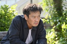 村田清役の津田寛治。