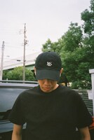 「2022 FL$Nation CAP（'47 CLEAN UP）」を着用したJJJ。