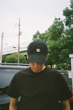「2022 FL$Nation CAP（'47 CLEAN UP）」を着用したJJJ。
