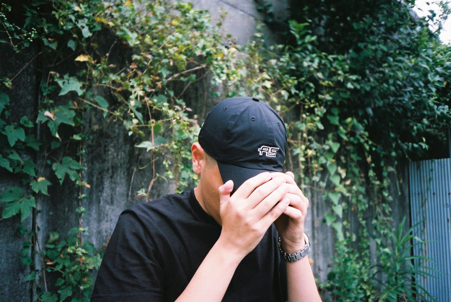 「2022 FL$Nation CAP（Solotex'47 CLEAN UP）」を着用したJJJ。