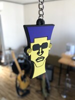 新グッズのキーホルダー。