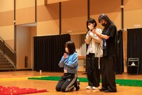 祈るナオ・オブ・ナオチーム。