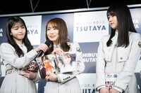 左から久保史緒里、秋元真夏、賀喜遥香。