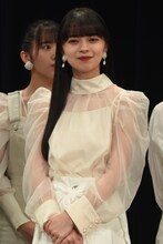 上國料萌衣。大きく愛しているものは「アンジュルム」。