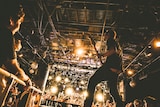 臀部を露出しているSTOMPIN' BIRDのYASU(B, Vo)。(Photo by Naoto Iwabuchi)
