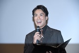 「キリエのうた」公開記念舞台挨拶で司会を務めた笠原秀幸。