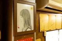 店内にはお客さん持ち込みのファンアートも。