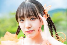 カメラ目線の桜井えま。