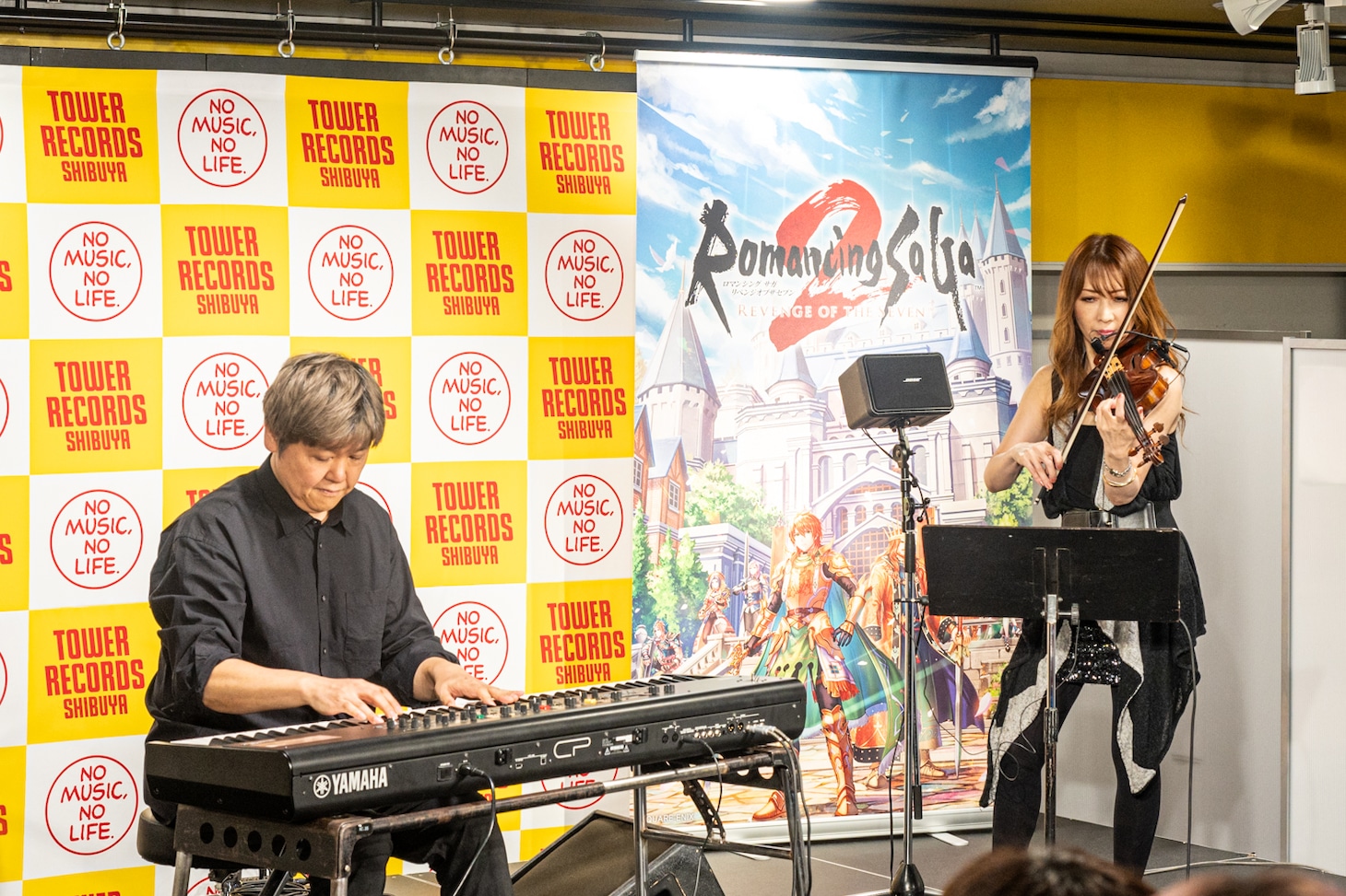 伊藤賢治と土屋玲子。