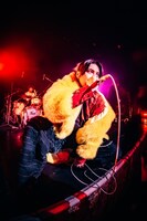 須賀京介（Vo / Am Amp）