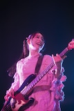 TOMOMI(B, Vo)(Photo by Takeshi Yao)