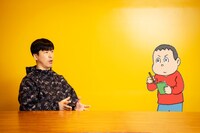 真剣にインタビューするキニナル君。