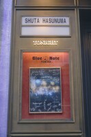 会場前に掲出された「蓮沼執太フィル × BNT 2025」ポスター。（Photo by YUKI KAWASHIMA）