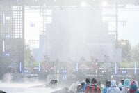 水浸しの場内。