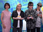 左から住吉美紀アナウンサー、TM NETWORK。