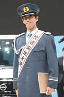 笑顔のリョウガ交通安全大使。