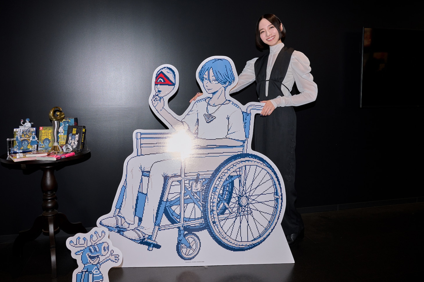 センター長の車椅子を押すのっちさん。