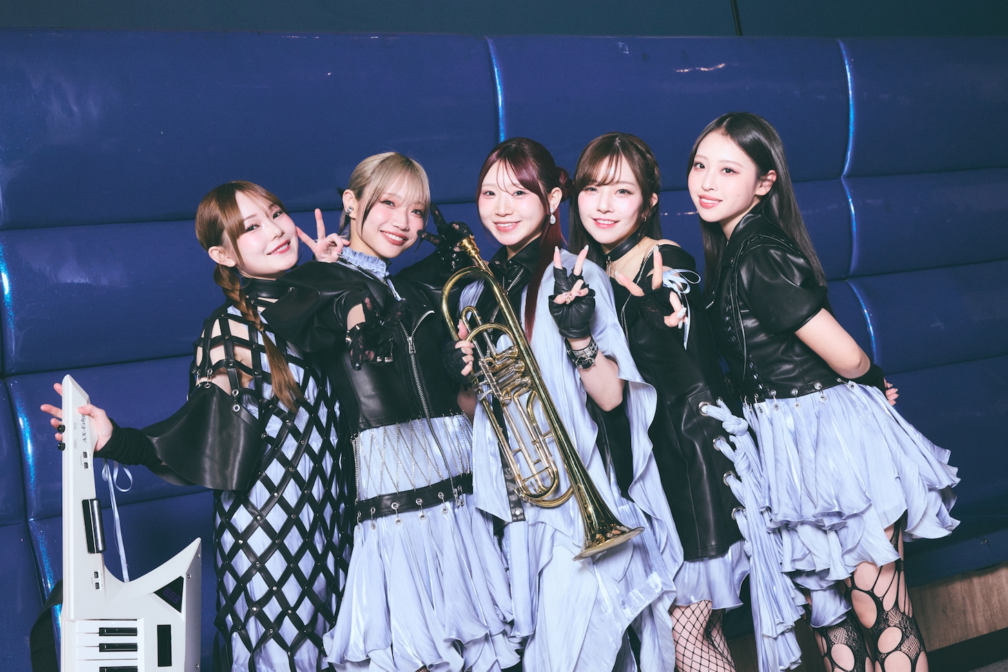 笑顔でポーズを決めるCiON。（撮影：ヨシモリユウナ）