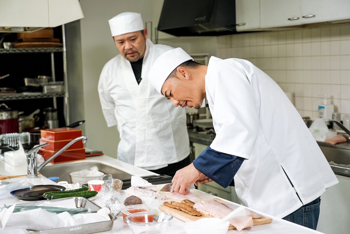 漢 a.k.a. GAMIとAK-69。