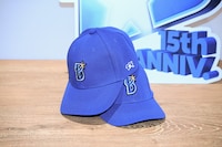 神奈川県内の子供たちに配布される「15th MEMORIAL CAP」。