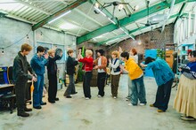 ハイタッチを交わすBOYNEXTDOORとINIメンバー。（Photo by Yukiya Kanda）