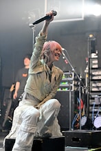 Asakura（Vo, G / muque）