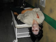 「リンカーンお化け屋敷」で長い廊下に横たわるお化け。