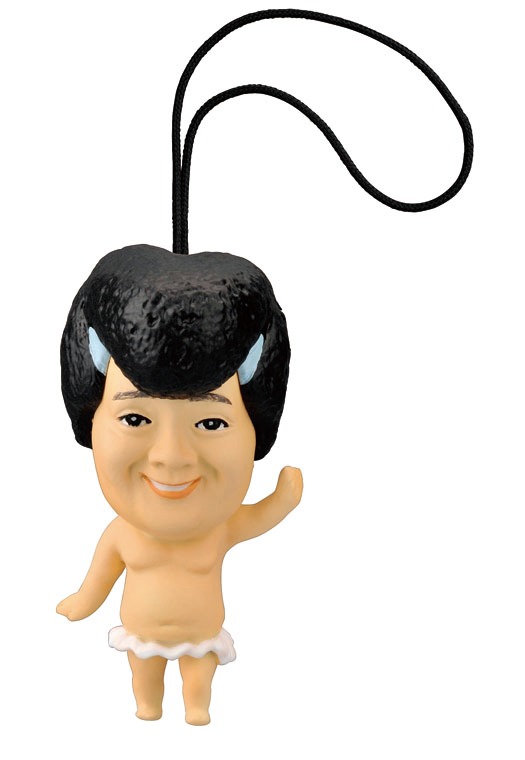 リーゼントのヅラをかぶった小杉。