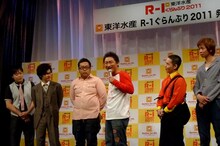 写真中央はGたかし。