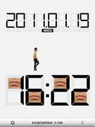 iPad専用アプリ「江頭2:50の オレが時計だ～ほぼ実寸大?!～（for iPad）」の「置き時計」画面（縦置き）。