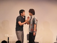 アンジャッシュ。借金取りの渡部に追われる児嶋は、その場をなんとか取り繕おうと、とんでもないウソをついていしまう。